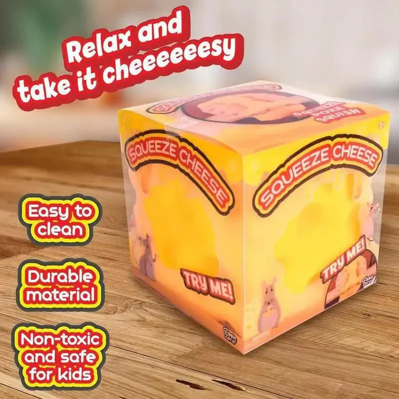 A yellow cube shaped cheese stress relief toy with squeeze features and labels for easy cleaning and durability.