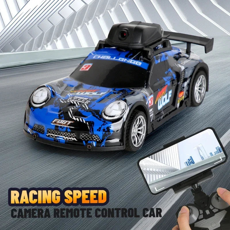 A black and blue racing speed camera remote control car is shown on a gray surface.