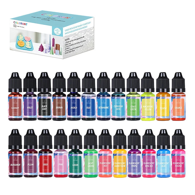 A collection of vibrant candle dye pigments in various shades including purple, green, yellow, and orange.