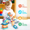 A toddler is interacting with a Montessori busy board featuring activities like color recognition, sensory exploration, hand-