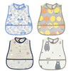 A set of four cute cartoon waterproof baby bibs in various patterns and colors.