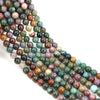 A string of round, loose natural India agate beads in various shades of green, brown, and purple.