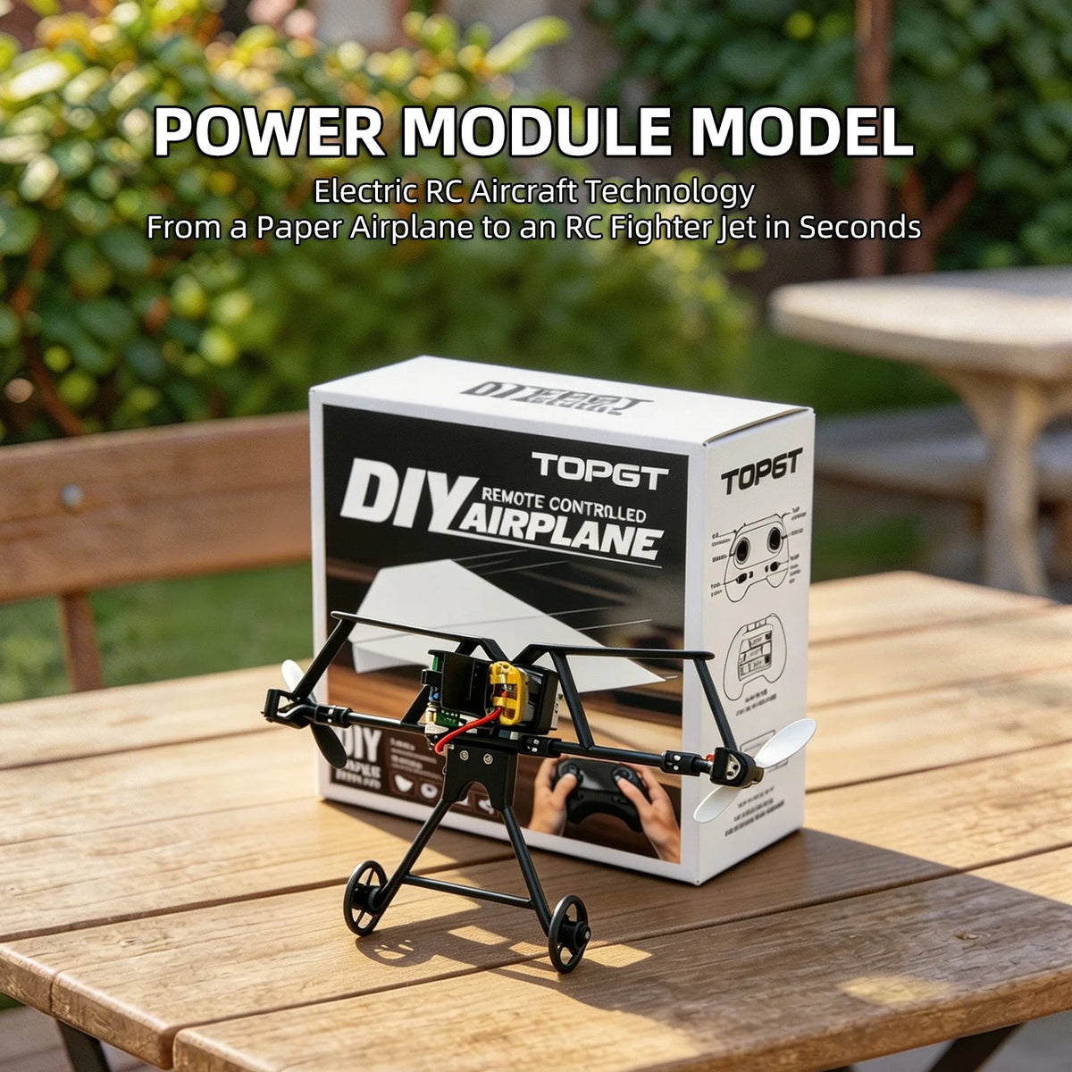 A DIY remote controlled paper airplane model kit displayed on a wooden table with greenery in the background.