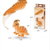 A set of 3D paper animal puzzles featuring dinosaurs and ocean creatures, including a long fish-like creature and a turtle.
