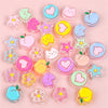 A collection of colorful enamel charm beads in various shapes and colors for DIY jewelry making