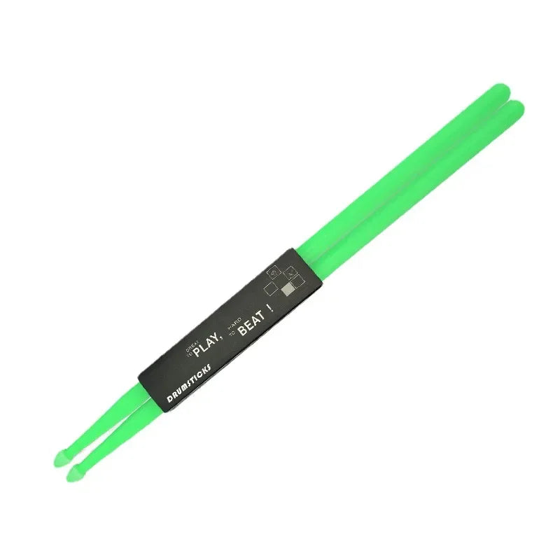A pair of bright green 5A nylon drumsticks with a non-slip grip.