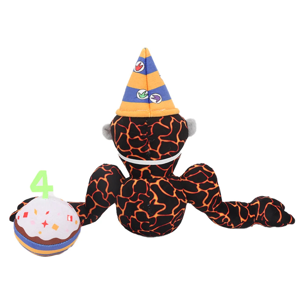 A black gorilla plush toy with orange and blue accents, featuring a conical hat and a spherical accessory.