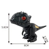 A black finger dinosaur fidget toy with movable joints resembling a Jurassic biting tyrannosaurus.