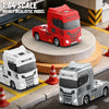A red and black 1:64 scale model of a truck is displayed on a round wooden base with surrounding accessories.