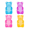 Four translucent silicone fidget cubes in blue, pink, purple, and yellow for sensory relief