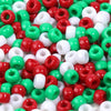 A close-up view of a large pack of rainbow pony beads in various colors including red, green, and white.