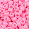 A close-up view of small pink pony beads used for jewelry making and crafts.