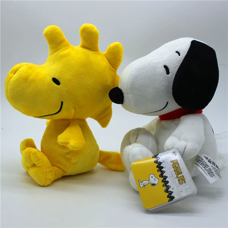 A yellow and white plush set featuring Snoopy and Woodstock characters.