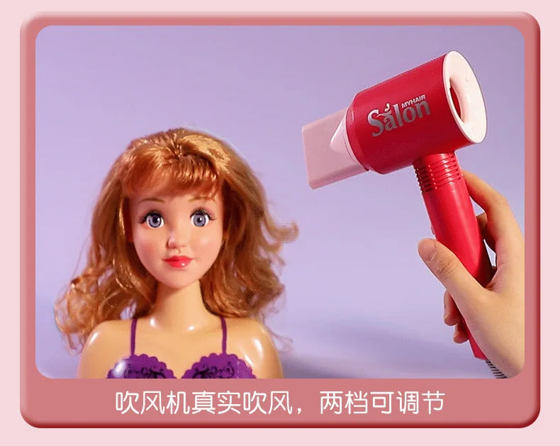 A hand holds a pink hairdryer, demonstrating the use of a kids' pretend play hair stylist beauty salon set.