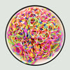 A bowl filled with numerous colorful rainbow loom bands for DIY bracelet making.