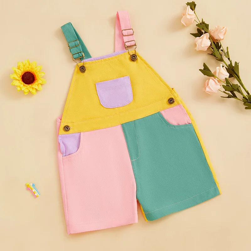 A yellow and pink summer contrast color overalls romper for toddlers with purple accents.