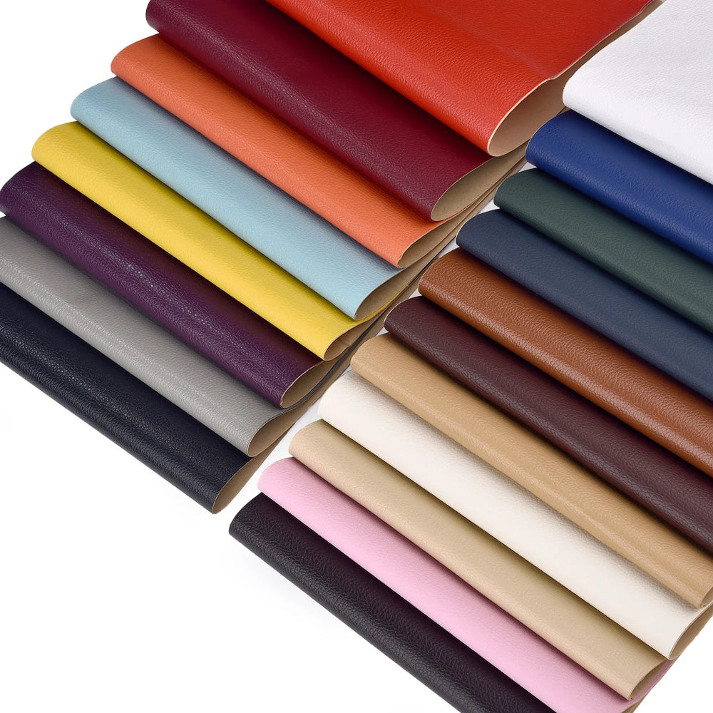 A stack of self-adhesive PU leather repair patches in various colors, arranged diagonally.
