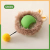 A green motion-activated cat toy featuring a rolling ball surrounded by soft brown and cream faux fur.