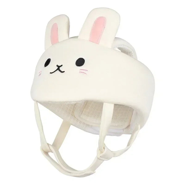 A white toddler safety helmet with pink bunny ears and a soft head cushion for crawling.