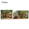 A wooden book nook kit featuring a detailed floral display with integrated LED lighting.