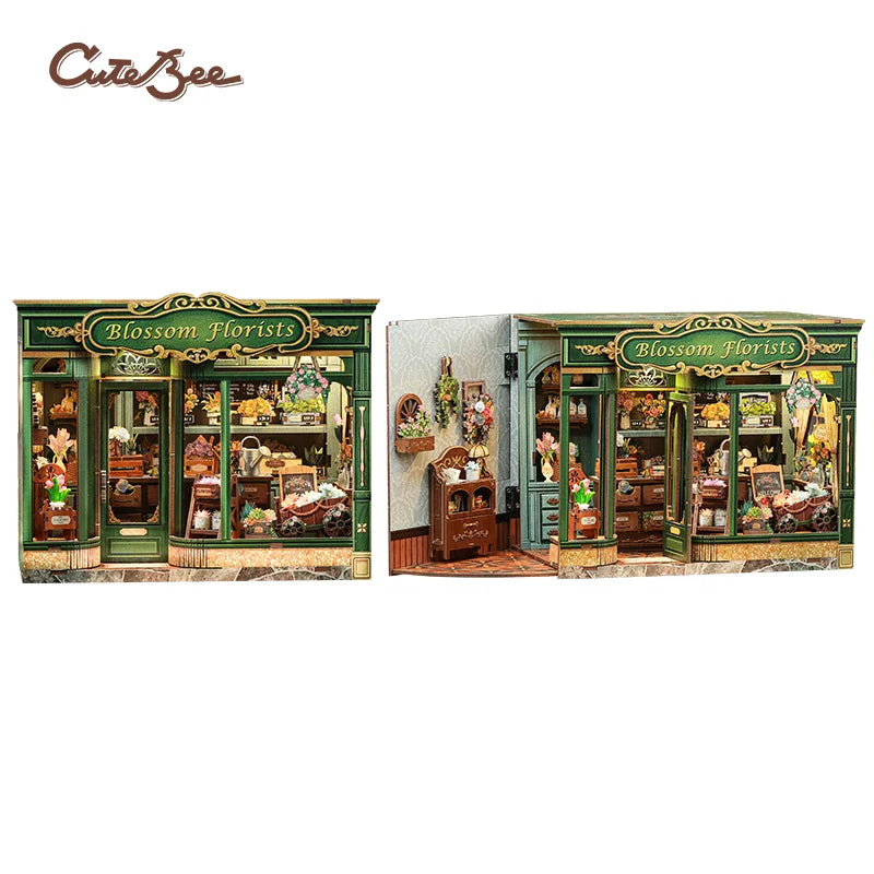 A wooden book nook kit featuring a detailed floral display with integrated LED lighting.