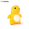 A yellow, soft plush toy of a dinosaur or dragon with large eyes and a light-colored belly.