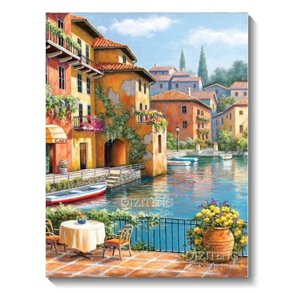 A vibrant painting of an old terracotta building overlooking a blue water, with lush greenery and a stone dock.