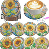 A set of floral diamond painting coasters featuring yellow and green flowers on a metal holder.
