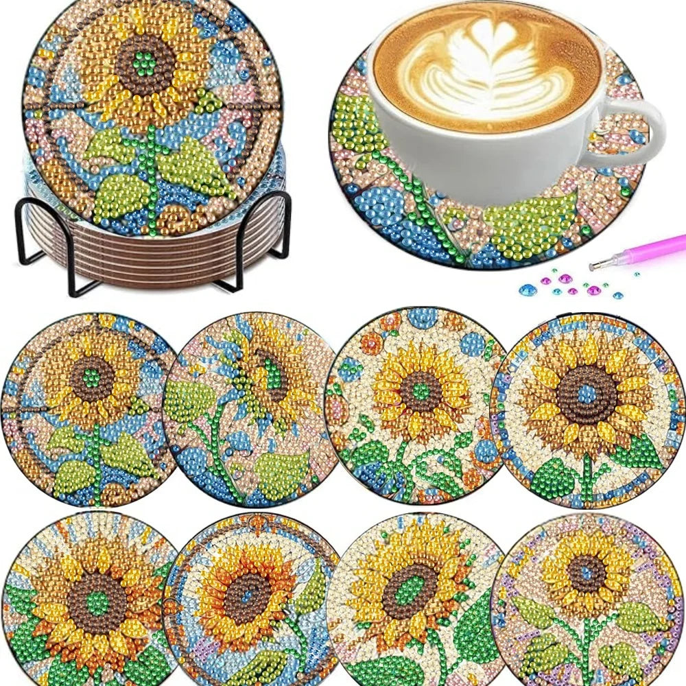 A set of floral diamond painting coasters featuring yellow and green flowers on a metal holder.
