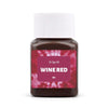 A dark brown bottle of wine red textile fabric dye powder with a white cap.