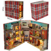 A DIY wooden book nook kit featuring a detailed Japanese alley miniature scene with illuminated windows and storefronts.