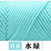 A close-up of a teal colored yarn, labeled as 06 Water Yarn, showing the twisted texture.