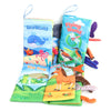 A colorful soft fabric baby book featuring sea creatures and a frog, with attached tails.
