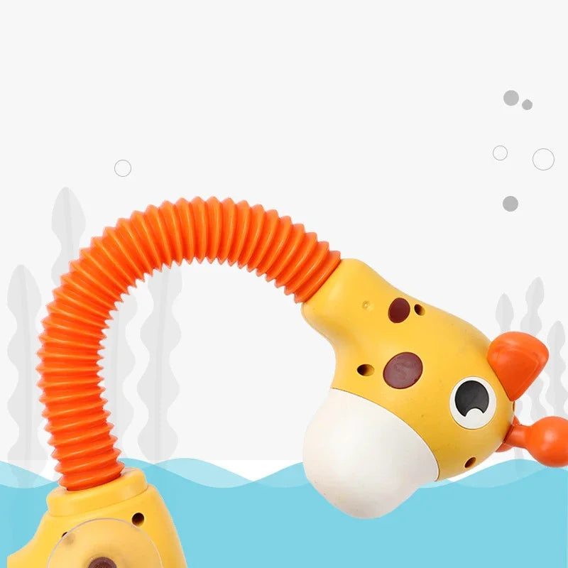 A yellow giraffe-shaped spray water toy with an orange flexible tube is shown against a blue background.