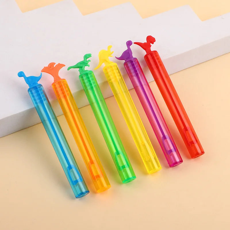 A collection of colorful dinosaur-shaped bubble bottles in various shades of blue, green, yellow, purple, and orange.