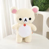 A cream-colored Kawaii Rilakkuma Strawberry Bear plush toy with pink ears and a white belly tag.