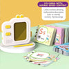 A pink camera toy is shown next to a stack of learning flash cards featuring letters and drawings.