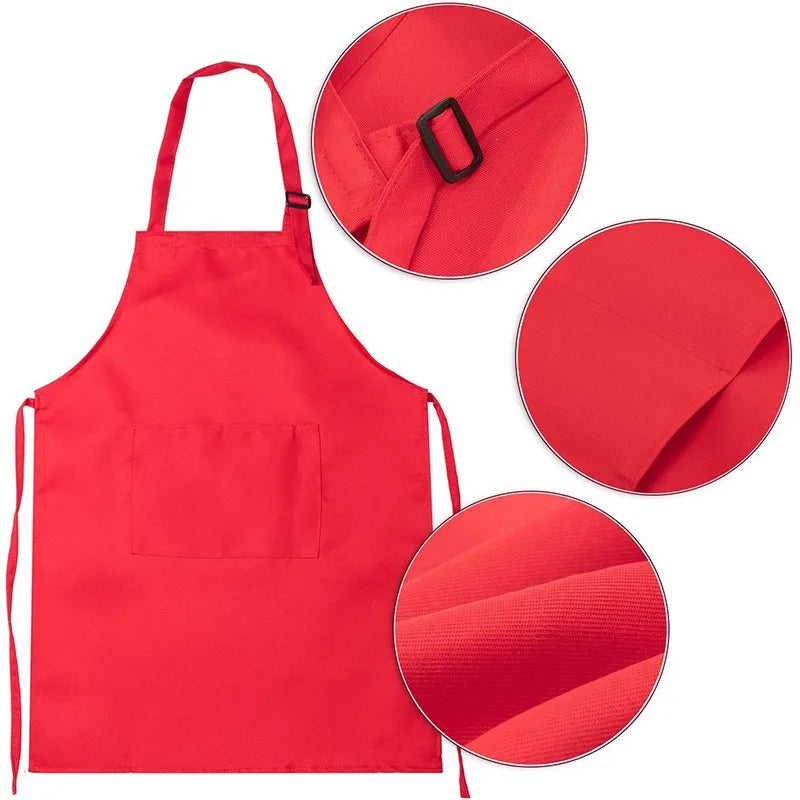 A bright red kids chef apron and hat set with a pocket and circular fabric pieces.