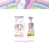 A colorful unicorn party supplies kit featuring rainbow themes and pink, purple, and green elements.