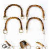 Three bamboo-style leather handles shown in various shapes and sizes for DIY bag projects