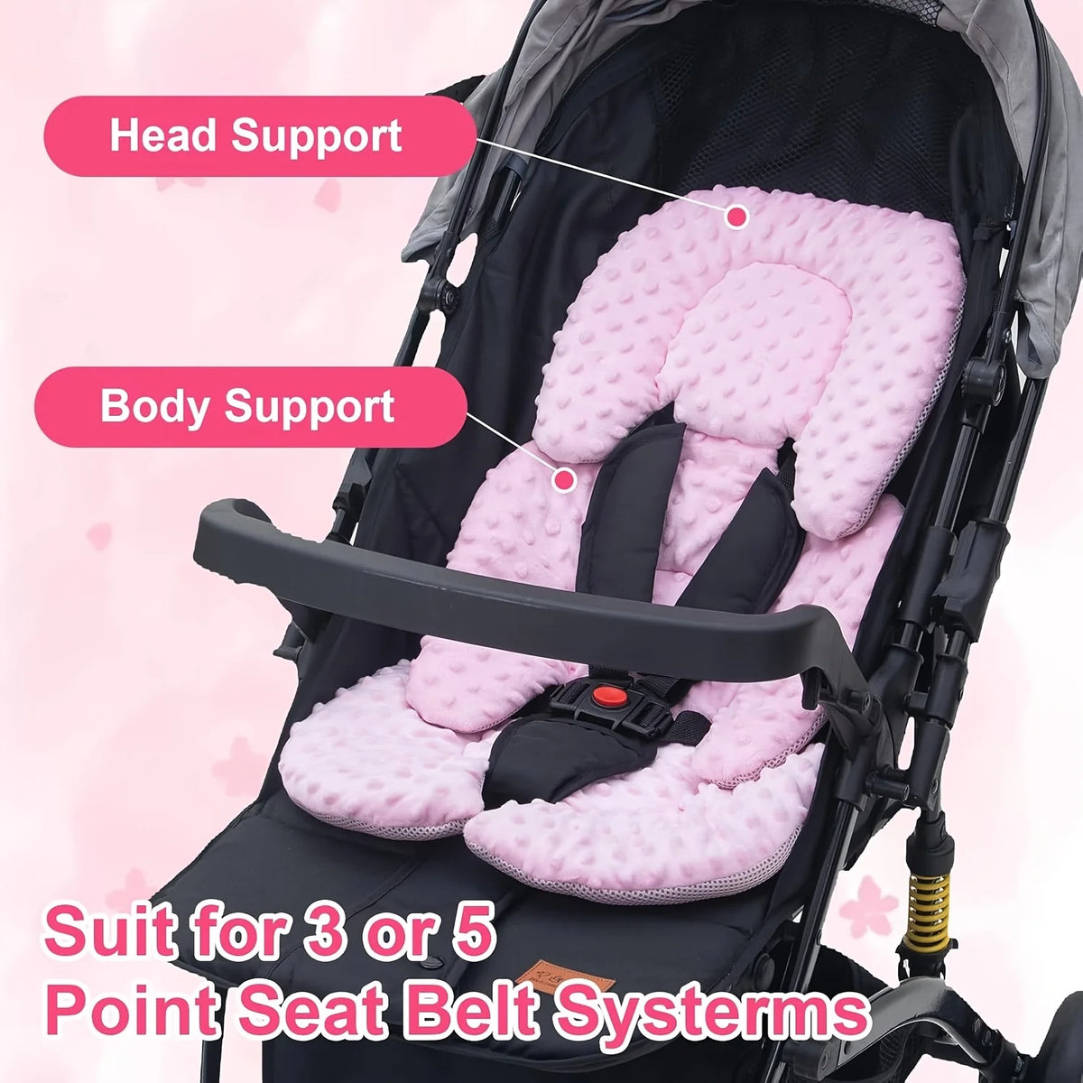 A pink plush seat cushion with head and body support is shown installed in a stroller seat, suitable for 3 or 5 point seat be