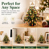 A DIY beaded Christmas tree kit decorated with colorful lights and ornaments displayed on a desk, bookshelf, side table, and 