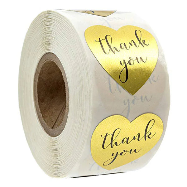 Roll of gold thank you stickers for gifts and packaging