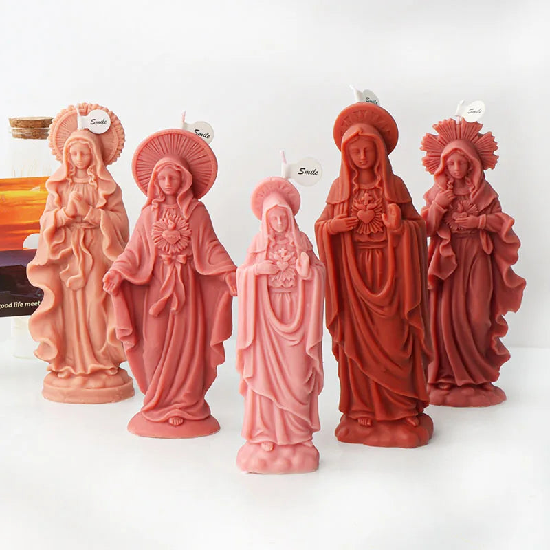 A set of five terracotta-colored silicone figure molds depicting Mary with halos for crafting.