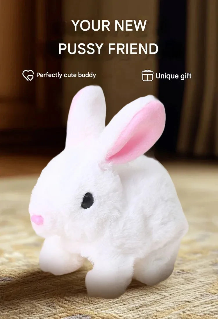 A white rabbit plush toy with pink inner ears sitting on a textured surface.