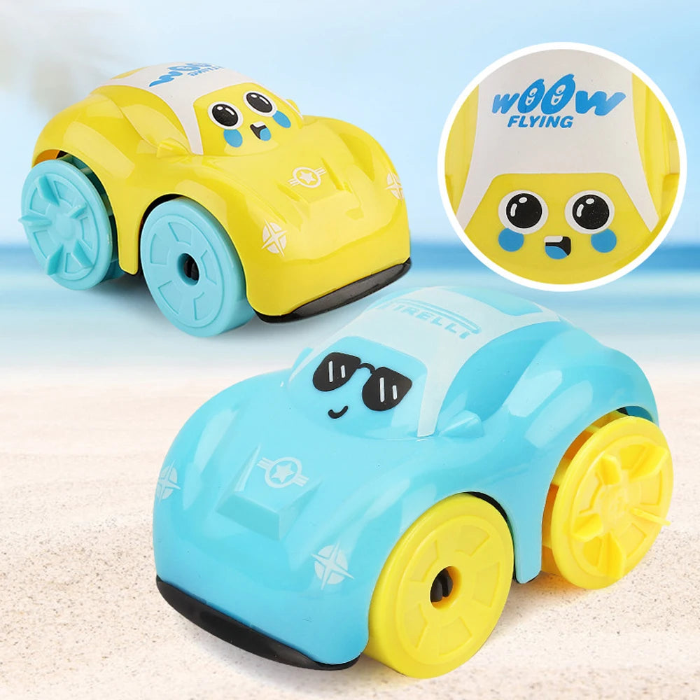 A yellow and blue clockwork duck bath toy car is shown on a sandy surface with an inset showing the WOW FLYING logo.