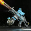 A blue automatic electric UMP45 water blaster is shown firing a stream of water against a dark background.