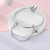 Sterling silver heart charm beads for bracelets featuring pink stones displayed on a white background.