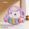 A purple unicorn-themed button background toy featuring a unicorn face and colorful animal buttons.