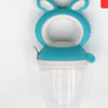 A silicone baby food feeder with a teether, featuring a light blue silicone top and a clear feeding tube.
